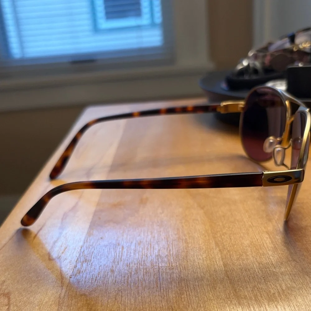 Oakley Gold Aviator Sunglasses with Purple Mirrored Lenses